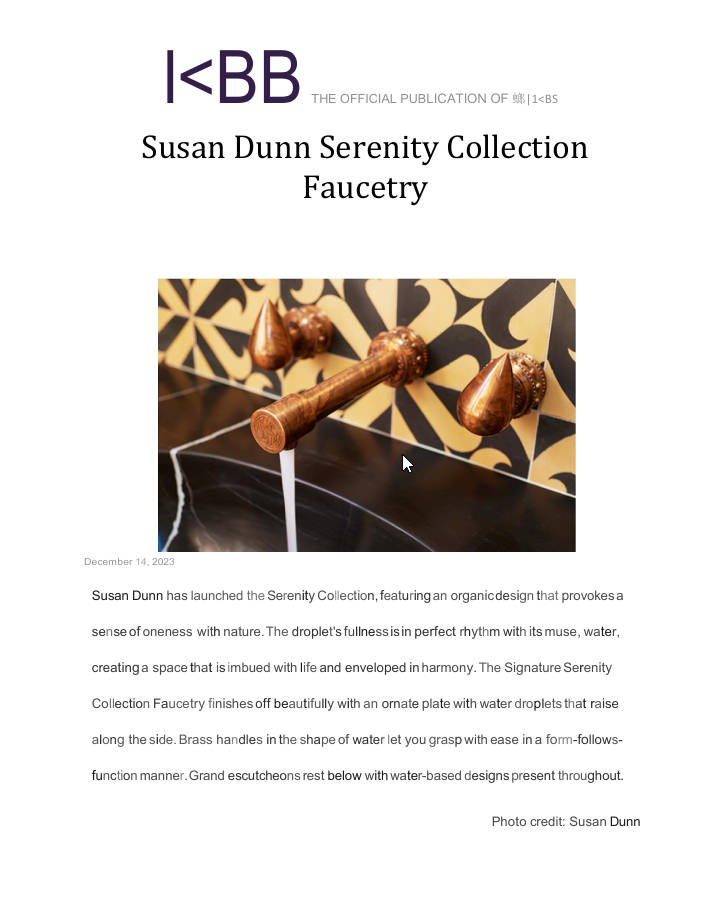 Decorative copper faucet with a geometric black-and-gold backsplash.